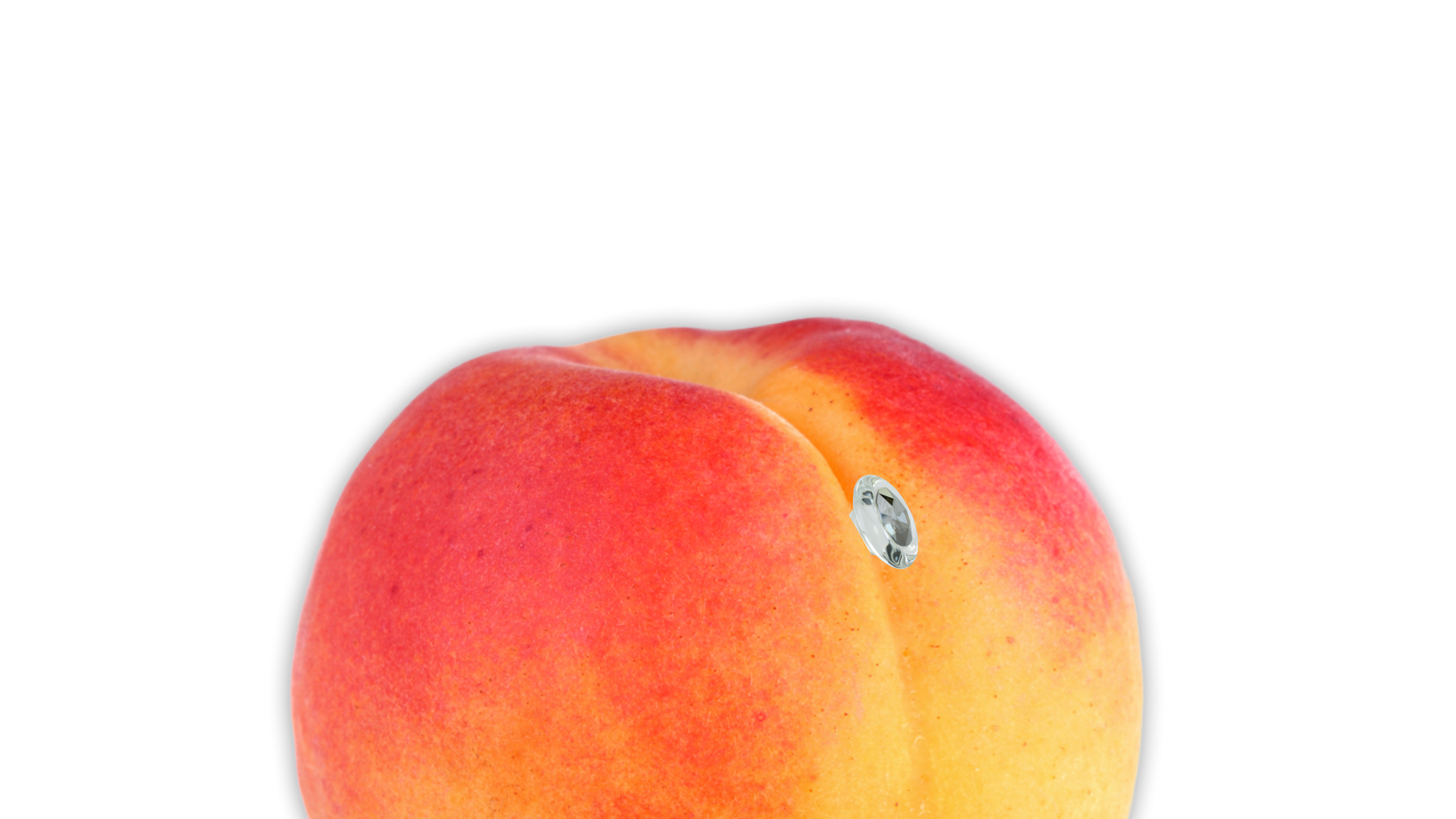 A single peach with a small anal plug in it.
